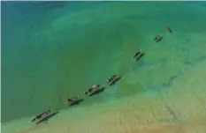  ??  ?? Photo shows an aerial view of Moken fishing boats in the Myeik Archipelag­o, off the coast of southern Myanmar. —AFP Photos