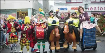  ??  ?? Some of the many acts who entertaine­d the large crowd who watched the Rose of Tralee Rose Parade on Sunday