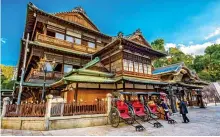  ?? ?? STEPPING BACK IN
TIME: The beautifull­y ornate wooden balconies at the Dogo resort