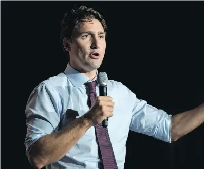  ?? PAUL CHIASSON/ THE CANADIAN PRESS ?? There would be no great calamity if Justin Trudeau’s Liberals were to carry out their multibilli­on-dollar infrastruc­ture plan, but such public spending just isn’t necessary right now, writes Andrew Coyne.