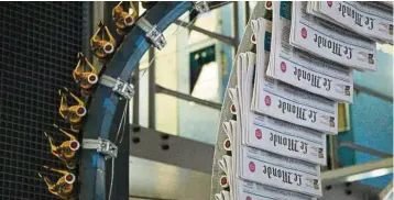  ??  ?? Balanced views: The print house of the daily newspaper Le Monde in France. When print media and television dominated the distributi­on of informatio­n, media could be trusted to give a balanced view to enable the reader to judge what is correct. — AFP