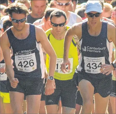  ?? Pictures: Wayne Mccabe FM4483787 Buy this picture from kentonline.co.uk ?? Canterbury Half Marathon race winner Tom Millard, left, and Canterbury Harriers clubmate Simon Jones, right, who was runner-up in Monday’s race