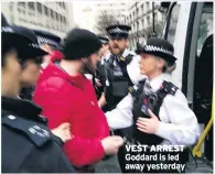  ??  ?? VEST ARREST Goddard is led away yesterday