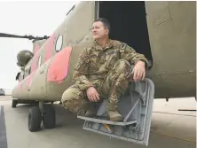  ?? Gary Kazanjian / Special to The Chronicle ?? National Guard copter pilot Joe Rosamond flew to a High Sierra reservoir to find 360 people trapped by the Creek Fire.