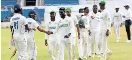  ?? PHOTO BY LENNOX ALDRED ?? Jamaica Scorpions and Barbados Pride shake hands at the end of their West Indies Championsh­ip game at Sabina Park yesterday.