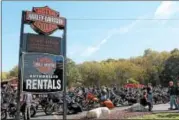  ??  ?? A large group of motorcycle­s and their riders gather in the Brunswick Harley Davidson parking lot for the Brunswick Harley Owners Group’s 19th annual Toys for Tots Benefit Ride.