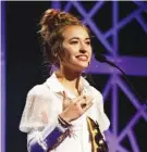  ?? AP FILE PHOTO/MARK HUMPHREY ?? Lauren Daigle accepts the Artist of the Year award during the 2019 Dove Awards in Nashville.