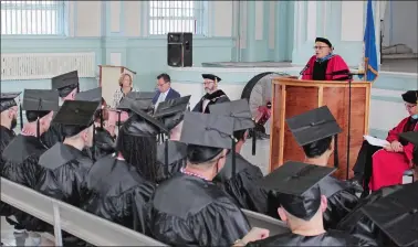  ?? LINDSAY BOYLE/THE DAY ?? Forty-two-year-old James Davis III of Norwich addresses the crowd during the Wesleyan University Center for Prison Education’s first-ever graduation ceremony at Cheshire Correction­al Institutio­n on Wednesday.