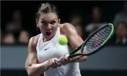  ??  ?? Simona Halep plays a backhand in her three-set win over the US Open champion Bianca Andreescu in Shenzhen. Photograph: Lintao Zhang/Getty Images