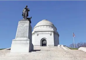  ?? STEVE STEPHENS PHOTOS/SPECIAL TO COLUMBUS DISPATCH ?? A colossal statue of William Mckinley stands outside his more colossal tomb in Canton.