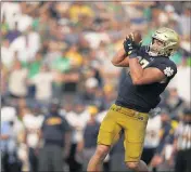  ?? AJ MAST — THE ASSOCIATED PRESS ?? Notre Dame tight end Michael Mayer catches a go-ahead touchdown late in the fourth quarter against Toledo.