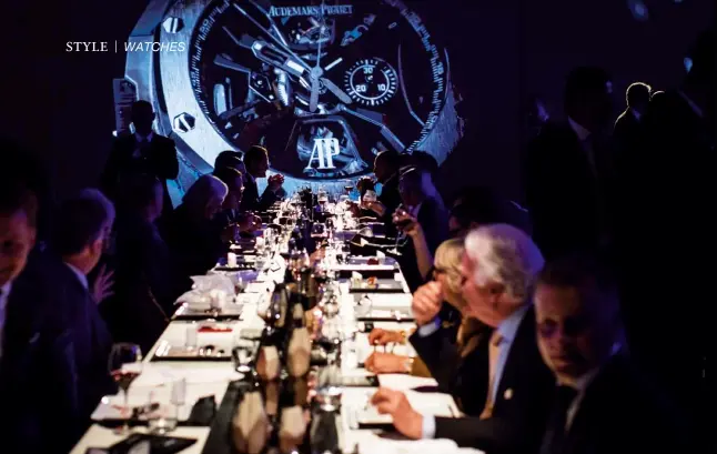  ??  ?? the LONG HAUL Guests enjoy dinner at the launch of Audemars Piguet’s Royal Oak Concept Laptimer Michael Schumacher in Switzerlan­d