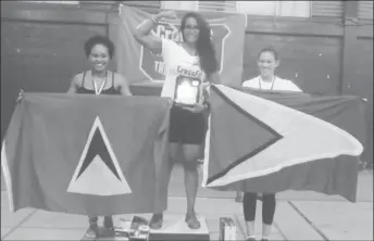  ??  ?? Rahman on the podium draped with the Golden Arrowhead after finishing third in the novices division at the CrossFit 12-12-12 Throw Down