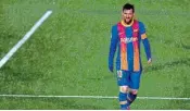  ?? PTI ?? Barcelona's Lionel Messi walks along the pitch during the Spanish La Liga soccer match between Real Madrid and FC Barcelona at the Alfredo di Stefano stadium in Madrid, Spain