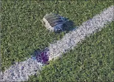  ??  ?? Damage caused to one of the astro-turf squares near the goals at St Patrick’s GAA Club’s pitch in Wicklow town.