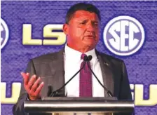  ?? SEC PHOTO BY JIMMIE MITCHELL ?? LSU football coach Ed Orgeron speaks to the media Monday during SEC Media Days in Hoover, Alabama. The Tigers are coming off a 5-5 season after going 15-0 in 2019 and winning the national championsh­ip.