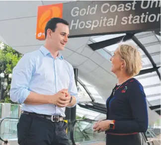  ??  ?? Mudgeeraba MP Ros Bates and Bonney LNP candidate Sam O'Connor meeting to discuss a police beat near the Gold Coast University Hospital.