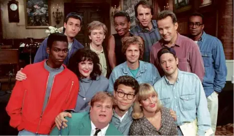  ?? AP FILE PHOTO ?? The cast of “Saturday Night Live” from 1992 included Dana Carvey (middle row, second from right) and David Spade (back row, second from left). Carvey and Spade co-host the “Fly on the Wall” podcast.