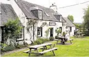  ??  ?? The Dores Inn, a restaurant and pub at Loch Ness, emphasizes local and seasonal ingredient­s.