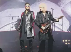  ??  ?? Adam Lambert fits well with Brian May and the rest of Queen