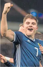  ??  ?? Ryan Christie breaks away from Israel’s Sheran Yeini. Left: James Forrest celebrates his hat-trick to make it five goals in four days. SNS.