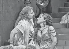  ?? METROPOLIT­AN OPERA ?? Tenor Roberto Alagna, left, and mezzo-soprano Elina Garanca rehearse a scene from Camille Saint-Saens’ Samson et Dalila. The opera will be broadcast Saturday live in HD to movie theatres.