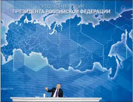  ?? ALEXANDER ZEMLIANICH­ENKO — THE ASSOCIATED PRESS ?? Russian President Vladimir Putin gestures while speaking during his annual news conference in Moscow on Thursday.