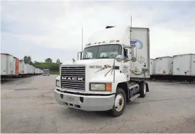  ?? JOURNAL SENTINEL FILES ?? A driver pulls his rig out of the terminal at Roadrunner Transporta­tion in Cudahy. Revenue for Roadrunner’s less-than-truckload segment fell 11% in the first three quarters of 2016.