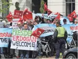  ?? ANDREW BIRAJ, AFP/GETTY IMAGES ?? Pro-government activists welcome President Recep Tayyip Erdogan in Washington.