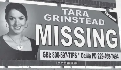  ?? ASSOCIATED PRESS FILE PHOTO ?? Teacher Tara Grinstead is prominentl­y displayed in 2006 on a billboard in Ocilla, Ga. A former beauty queen who taught at Irwin County High School, Grinstead was 30 years old when she vanished in October 2005 from her home.