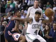  ?? CHARLES KRUPA — ASSOCIATED PRESS ?? Isaiah Thomas drives to the basket May 10 during the first quarter of a second-round playoff game in Boston against the Wizards.