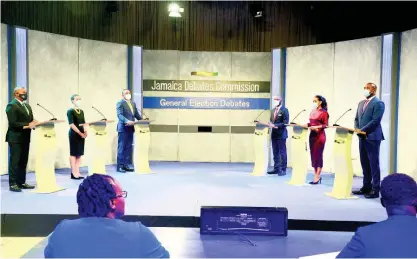  ?? COLIN REID ?? Debaters (from left) Floyd Green, Kamina Johnson-Smith, Dr Christophe­r Tufton, Raymond Pryce, Lisa Hanna and Dr Dayton Campbell face off in last night’s first political debate.