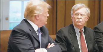  ?? OLIVIER DOULIERY/ABACA PRESS ?? President Donald Trump, left, and then national security adviser John Bolton attend a 2018 briefing in the White House.