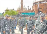  ?? ANI & SANCHIT KHANNA/HT PHOTO ?? (Left) Protesters outside Jama Masjid on Friday; (Right) paramilita­ry personnel deployed outside the mosque premises to tackle the prevailing situation.