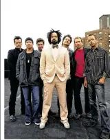  ?? CONTRIBUTE­D BY DANNY CLINCH ?? Singer Adam Duritz (center) and Counting Crows bring the“Somewhere Under Wonderland”tour to Austin on Wednesday.