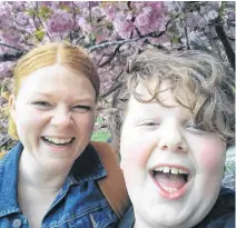  ??  ?? Ten-year-old Xavier Pierson, shown here in a selfie with his mother, Sarah Smellie, thinks his mom came up with a good idea when she created You Could Do This Too, a series of video chats for kids, allowing them to pick the brains of some accomplish­ed, skilled and talented local people doing cool things.