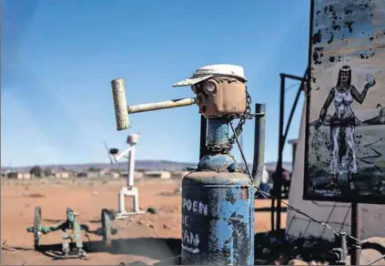  ?? Photos: Oupa Nkosi ?? Mystic mastery: Credo Mutwa (far right) is also a gifted painter and sculptor, and his creations dot the grounds of his compound near Kuruman. This no-nonsense nonagenari­an believes that ‘art is a medicine which, prepared craftily, can cure people’.