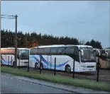  ??  ?? Anchor Tours take no chances with Ophelia and park their buses in Bellurgan FC’s car park.