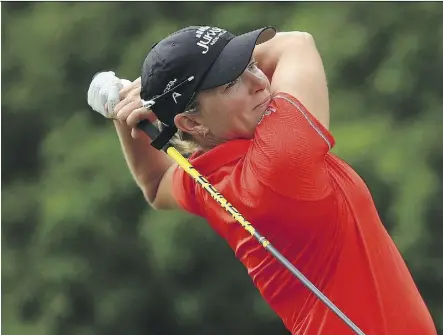  ?? VAUGHN RIDLEY/GETTY IMAGES ?? Alena Sharp of Hamilton shot a 6-under 66 in the second round to take a share of the lead at the LPGA Classic in Cambridge, Ont.