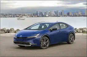  ?? NATHAN LEACH-PROFFER/COURTESY OF TOYOTA MOTOR SALES U.S.A. VIA AP ?? This shows the 2023Toyota Prius. The latest generation has sleek styling and muchimprov­ed accelerati­on to go along with its stellar fuel economy of up to an EPA-estimated 57 mpg.