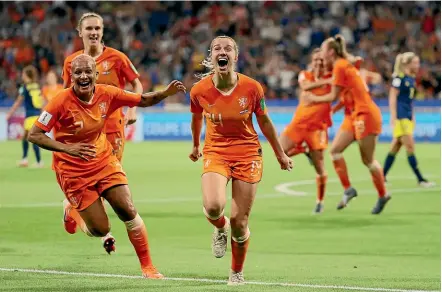  ?? GETTY IMAGES ?? Jackie Groenen, of the Netherland­s, celebrates after scoring to secure a 1-0 win over Sweden.