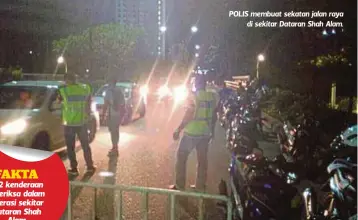  ??  ?? POLIS membuat sekatan jalan raya
di sekitar Dataran Shah Alam.