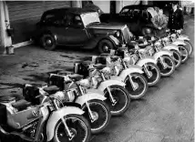  ??  ?? After four LE Velocettes had already been bought by the force, nine more report for duty at the headquarte­rs of Kent County Constabula­ry in Maidstone, Kent, in 1950 to make up a fleet of 13. Note the immaculate Wolseley in the background.