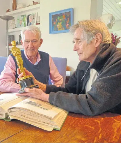  ??  ?? Above: John Paterson, left, and Piers Bedford with the award. Below: Neil Paterson in his playing days.