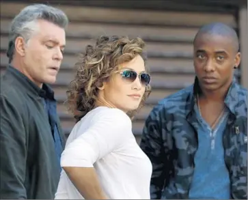  ?? Carolyn Cole ?? RAY LIOTTA, left, Jennifer Lopez and Hampton Fluker are on the set in Harlem to shoot “Shades of Blue.”