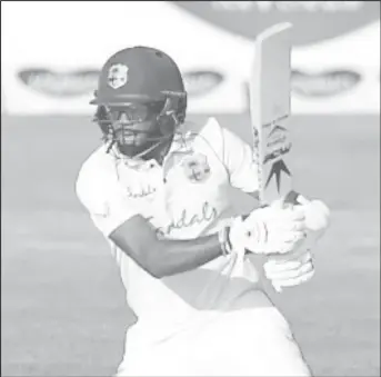  ??  ?? Kraigg Brathwaite cuts en route to his unbeaten 49 on day two of the first Test against Bangladesh on Thursday.