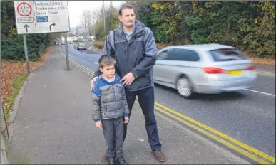  ?? Picture: Gary Browne FM4595446 ?? Mark Butcher and his son Joshua, seven at St Mary’s Primmary School