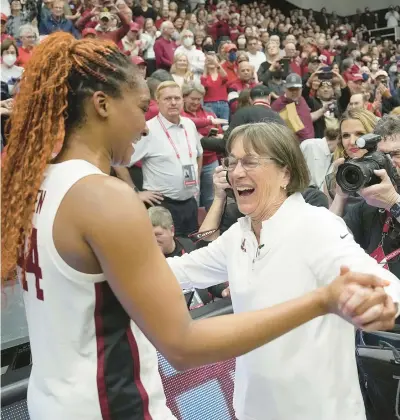  ?? GETTY FILE ?? Tara VanDerveer celebrates with player Kiki Iriafen after the Stanford coach passed Mike Krzyzewski for NCAA career wins in January.