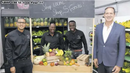  ?? (Photos: Garfield Robinson) ?? S Foods CEO Christophe­r Issa (right) with members of his team (from left) Manager - Deli & Grill Jonpaul Munn; General Store Manager Kareisa Hanson; and Assistant Manager Janoy Smith