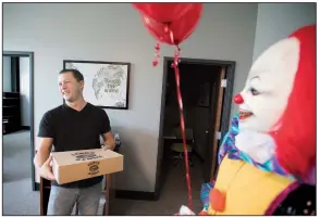  ?? NWA Democrat-Gazette/J.T. WAMPLER ?? “That’s just messed up,” Jacob Lum of Fayettevil­le says Tuesday after his creepy-clown doughnuts encounter.